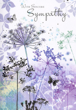 The artistry of this sympathy card feels like a quiet morning walk through Leyton's side streets, when the light is soft and the world has not quite woken up. Across the front, delicate umbelliferous flower heads rise on slender, arching stems, rendered in gentle watercolour tones of violet, soft blue, and pale grey-green. Each flower is formed from tiny, lace-like dots and strokes, creating an airy, almost weightless impression, as if a light breeze from nearby Sidmouth Park is passing through. The base of the card is washed with misty gradients-soft lavender melting into muted greens and blues-echoing the hush of an overcast sky. Here and there, almost see-through butterflies drift among the blossoms, their wings barely defined, like small moments of hope flickering through sorrow. The entire composition feels spacious and uncluttered, giving the eye room to wander and the mind permission to rest. From my perspective as a florist serving Leyton, this card's gentle palette and restrained detail mirror the feeling we aim for in our funeral and sympathy arrangements: calm, respectful, and quietly supportive. It doesn't shout or demand attention; it simply stands nearby, like a comforting presence at a service or a thoughtful gesture delivered to a home near Leyton Midland Road. Paired with soft-toned flowers and fresh greenery, this card adds a layer of visual solace, reminding the recipient that they are held in kind thoughts, even when words are hard to find.